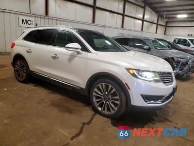 Czwarte zdjęcie samochodu z boku: 2016 LINCOLN MKX RESERVE VIN:2LMTJ8LP0GBL68270 - miniatura