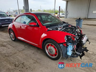 Czwarte zdjęcie samochodu z boku: 2018 VOLKSWAGEN BEETLE S VIN:3VWFD7AT5JM705338 - miniatura