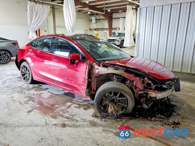 Czwarte zdjęcie samochodu z boku: 2022 TESLA MODEL 3 VIN:5YJ3E1EA9NF185390 - miniatura