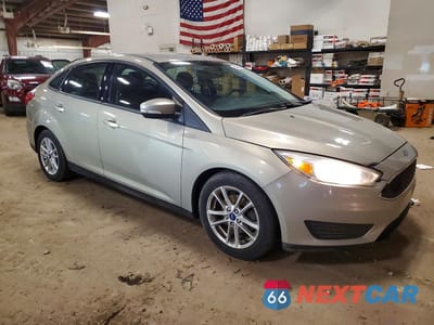 Czwarte zdjęcie samochodu z boku: 2016 FORD FOCUS SE VIN:1FADP3F28GL340938 - miniatura