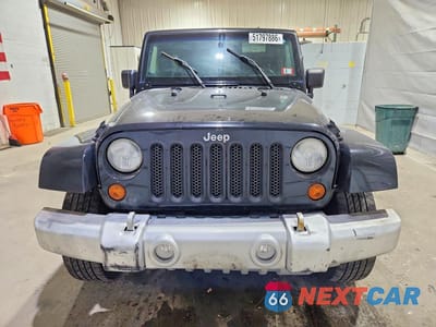 Piąte zdjęcie samochodu w środku: 2010 JEEP WRANGLER UNLIMITED SAHARA VIN:1J4BA5H17AL116967 - miniatura