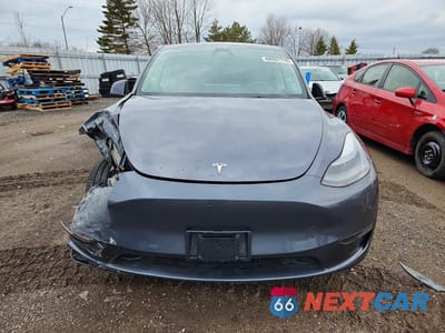 Piąte zdjęcie samochodu w środku: 2023 TESLA MODEL Y VIN:LRWYGDFD0PC222639 - miniatura