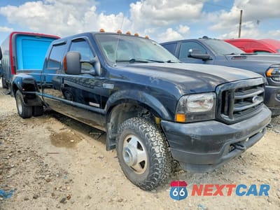 Czwarte zdjęcie samochodu z boku: 2004 FORD F350 SUPER DUTY VIN:1FTWW33P84EC94601 - miniatura