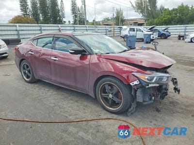Czwarte zdjęcie samochodu z boku: 2017 NISSAN MAXIMA 3.5 SL VIN:1N4AA6AP6HC416912 - miniatura