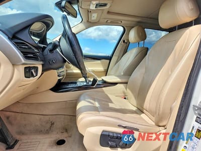Zdjęcie 7 z 13 samochodu: 2014 BMW X5 XDRIVE35I VIN:5UXKR0C5XE0H25099 - miniatura