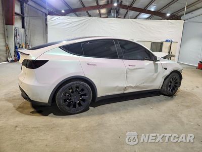 Trzecie zdjęcie samochodu z tyłu: 2023 TESLA MODEL Y VIN:7SAYGAEE1PF976683 - miniatura