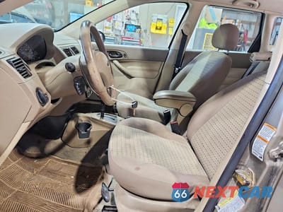 Zdjęcie 7 z 13 samochodu: 2005 FORD FOCUS ZXW VIN:1FAHP36N35W208077 - miniatura