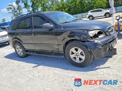 Czwarte zdjęcie samochodu z boku: 2006 KIA SORENTO LX VIN:KNDJD733965589746 - miniatura