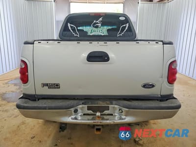 Zdjęcie 6 z 12 samochodu: 2003 FORD F150 SUPERCREW VIN:1FTRW08L13KB16031 - miniatura