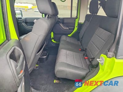 Zdjęcie 11 z 12 samochodu: 2012 JEEP WRANGLER UNLIMITED SPORT VIN:1C4HJWDGXCL262623 - miniatura