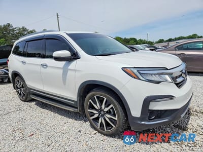 Czwarte zdjęcie samochodu z boku: 2022 HONDA PILOT TOURING VIN:5FNYF5H61NB020077 - miniatura