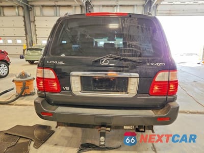 Zdjęcie 6 z 12 samochodu: 2004 LEXUS LX 470 VIN:JTJHT00W343541608 - miniatura