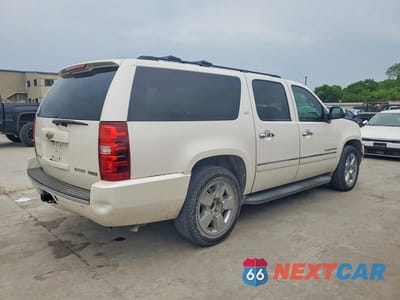 Trzecie zdjęcie samochodu z tyłu: 2011 CHEVROLET SUBURBAN C1500 LTZ VIN:1GNSCKE02BR289361 - miniatura