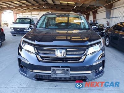 Piąte zdjęcie samochodu w środku: 2022 HONDA PILOT SE VIN:5FNYF6H27NB072395 - miniatura