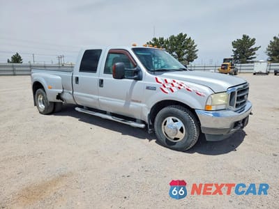 Czwarte zdjęcie samochodu z boku: 2003 FORD F350 SUPER DUTY VIN:1FTWW32P73ED24736 - miniatura
