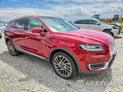 Czwarte zdjęcie samochodu z boku: 2019 LINCOLN NAUTILUS RESERVE VIN:2LMPJ8LP4KBL31183 - miniatura