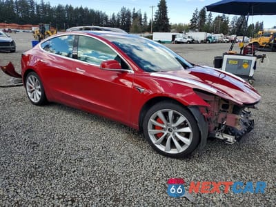 Czwarte zdjęcie samochodu z boku: 2018 TESLA MODEL 3 VIN:5YJ3E1EB6JF097433 - miniatura