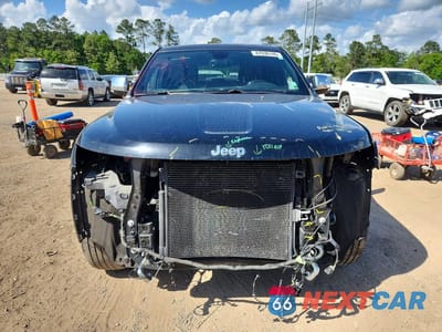 Piąte zdjęcie samochodu w środku: 2017 JEEP GRAND CHEROKEE OVERLAND VIN:1C4RJECG5HC634036 - miniatura