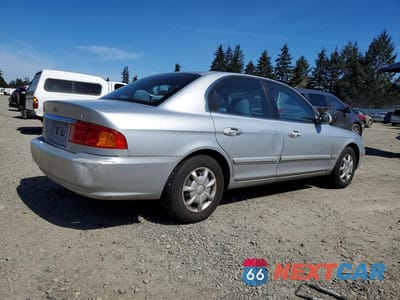 Trzecie zdjęcie samochodu z tyłu: 2001 KIA OPTIMA LX VIN:KNAGD126115032175 - miniatura