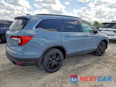 Trzecie zdjęcie samochodu z tyłu: 2022 HONDA PILOT SE VIN:5FNYF5H23NB027156 - miniatura