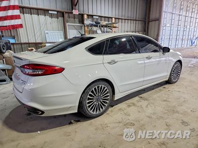Trzecie zdjęcie samochodu z tyłu: 2017 FORD FUSION TITANIUM VIN:3FA6P0K98HR118087 - miniatura