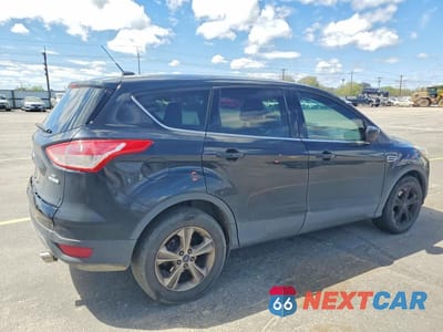 Trzecie zdjęcie samochodu z tyłu: 2016 FORD ESCAPE SE VIN:1FMCU0GX6GUC01727 - miniatura