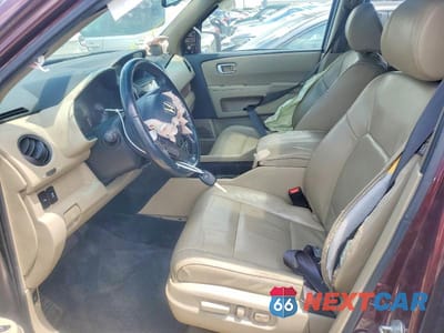 Zdjęcie 7 z 13 samochodu: 2012 HONDA PILOT TOURING VIN:5FNYF3H99CB040508 - miniatura