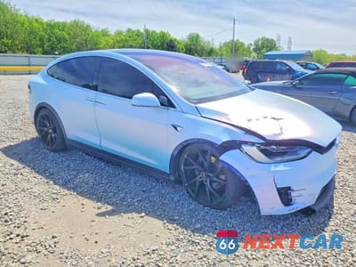 Czwarte zdjęcie samochodu z boku: 2017 TESLA MODEL X VIN:5YJXCDE25HF051269 - miniatura
