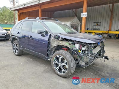 Czwarte zdjęcie samochodu z boku: 2023 TOYOTA RAV4 PRIME XSE VIN:JTMEB3FV1PD117335 - miniatura