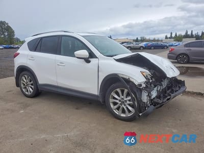 Czwarte zdjęcie samochodu z boku: 2013 MAZDA CX-5 GT VIN:JM3KE4DE1D0134083 - miniatura
