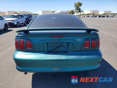 Zdjęcie 6 z 11 samochodu: 1998 FORD MUSTANG VIN:1FAFP4040WF186523 - miniatura