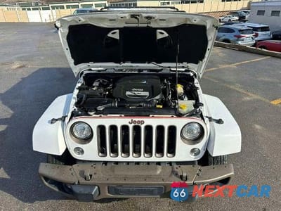 Piąte zdjęcie samochodu w środku: 2017 JEEP WRANGLER UNLIMITED SAHARA VIN:1C4BJWEG9HL537281 - miniatura