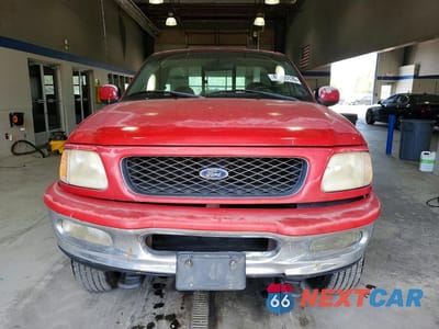 Piąte zdjęcie samochodu w środku: 1998 FORD F150 VIN:1FTZF08W5WKB66073 - miniatura