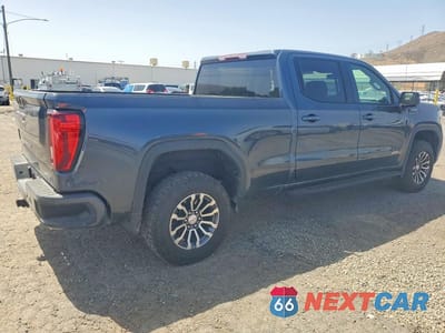 Trzecie zdjęcie samochodu z tyłu: 2021 GMC SIERRA K1500 AT4 VIN:1GTP9EEL2MZ400163 - miniatura