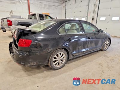 Trzecie zdjęcie samochodu z tyłu: 2014 VOLKSWAGEN JETTA SE VIN:3VWD17AJ9EM419934 - miniatura