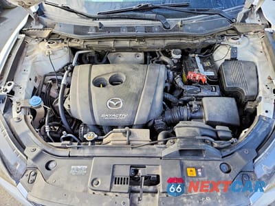 Zdjęcie 12 z 12 samochodu: 2016 MAZDA CX-5 TOURING VIN:JM3KE4CY9G0760755 - miniatura