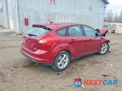 Trzecie zdjęcie samochodu z tyłu: 2014 FORD FOCUS SE VIN:1FADP3K20EL405381 - miniatura