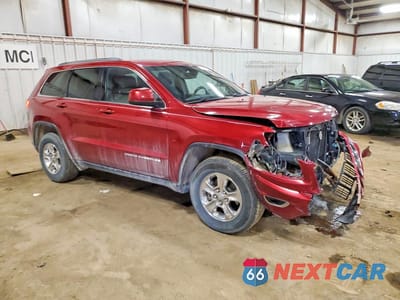 Czwarte zdjęcie samochodu z boku: 2014 JEEP GRAND CHEROKEE LAREDO VIN:1C4RJFAGXEC123474 - miniatura