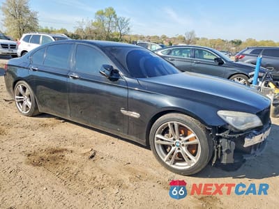 Czwarte zdjęcie samochodu z boku: 2015 BMW 750 I VIN:WBAYA8C59FGK19798 - miniatura