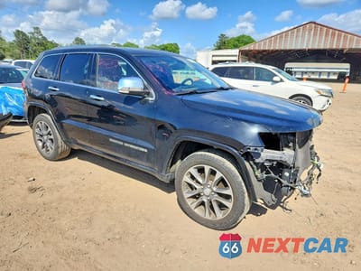 Czwarte zdjęcie samochodu z boku: 2017 JEEP GRAND CHEROKEE OVERLAND VIN:1C4RJECG5HC634036 - miniatura