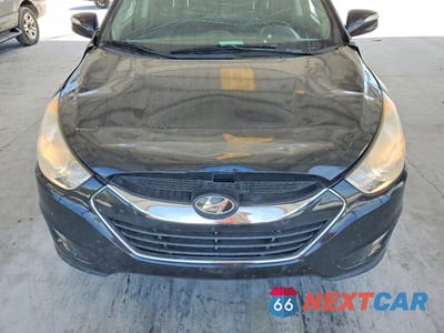 Zdjęcie 11 z 12 samochodu: 2012 HYUNDAI TUCSON LIMITED VIN:KM8JUCAC6CU514401 - miniatura
