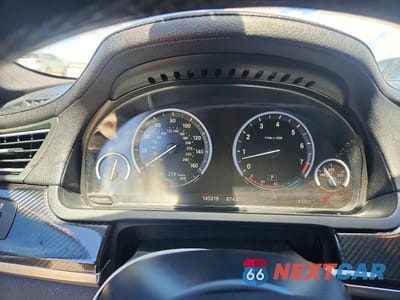 Zdjęcie 9 z 13 samochodu: 2012 BMW 740 I VIN:WBAKA4C51CDS99402 - miniatura