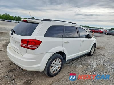 Trzecie zdjęcie samochodu z tyłu: 2016 DODGE JOURNEY SE VIN:3C4PDCAB1GT247111 - miniatura