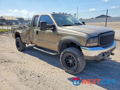 Czwarte zdjęcie samochodu z boku: 2004 FORD F250 SUPER DUTY VIN:1FTNX21S74EA92715 - miniatura