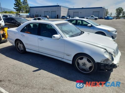 Czwarte zdjęcie samochodu z boku: 2001 MERCEDES-BENZ E 430 VIN:WDBJF70J21B215288 - miniatura