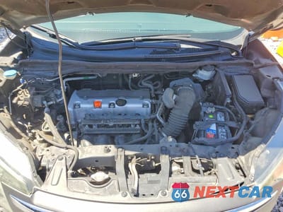 Zdjęcie 12 z 13 samochodu: 2014 HONDA CR-V LX VIN:2HKRM3H37EH527698 - miniatura