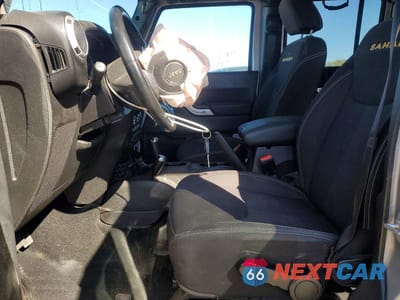 Zdjęcie 7 z 12 samochodu: 2013 JEEP WRANGLER UNLIMITED SAHARA VIN:1C4BJWEG5DL617770 - miniatura