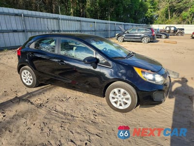 Czwarte zdjęcie samochodu z boku: 2015 KIA RIO 5-DOOR LX VIN:KNADM5A38F6515486 - miniatura