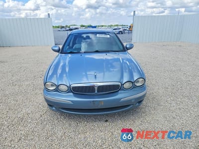 Piąte zdjęcie samochodu w środku: 2004 JAGUAR X-TYPE 3.0 VIN:SAJEA51C34WD74392 - miniatura