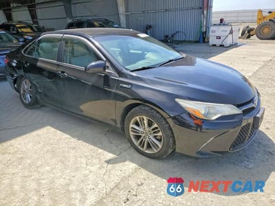 Czwarte zdjęcie samochodu z boku: 2015 TOYOTA CAMRY HYBRID SE VIN:4T1BD1FK7FU175645 - miniatura